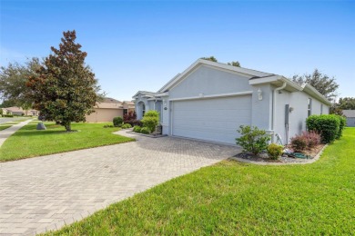 The best home on the block priced to sell! This beautifully on Arlington Ridge Golf Club in Florida - for sale on GolfHomes.com, golf home, golf lot