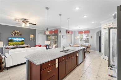 The best home on the block priced to sell! This beautifully on Arlington Ridge Golf Club in Florida - for sale on GolfHomes.com, golf home, golf lot
