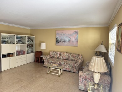 2/2 1st floor light & bright condo,with newer enclosed patio on Addison Reserve in Florida - for sale on GolfHomes.com, golf home, golf lot