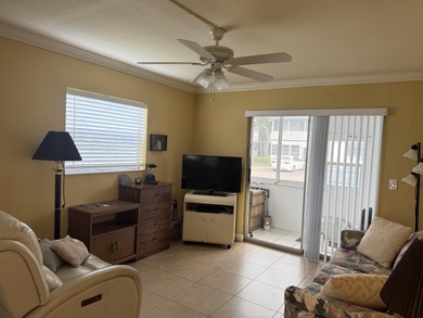 2/2 1st floor light & bright condo,with newer enclosed patio on Addison Reserve in Florida - for sale on GolfHomes.com, golf home, golf lot