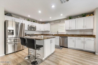 This stunning recently remodeled 5-bed, 3-bath home is a on Augusta Ranch Golf Club in Arizona - for sale on GolfHomes.com, golf home, golf lot
