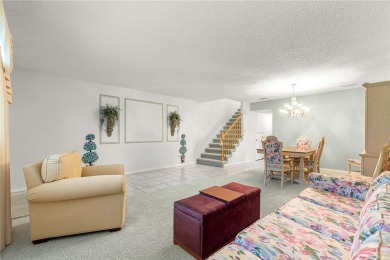 SPACIOUS Two-Level Townhome located in the Americana on On Top of the World Golf Course in Florida - for sale on GolfHomes.com, golf home, golf lot