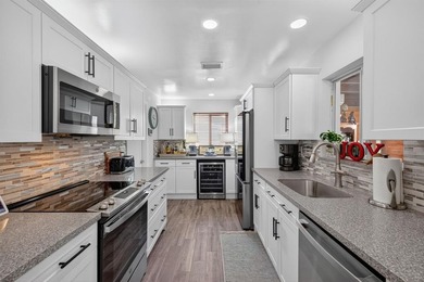 Beautifully renovated 2BR/2BA single-family home with NEW solar on Leisureville Community Association in Florida - for sale on GolfHomes.com, golf home, golf lot