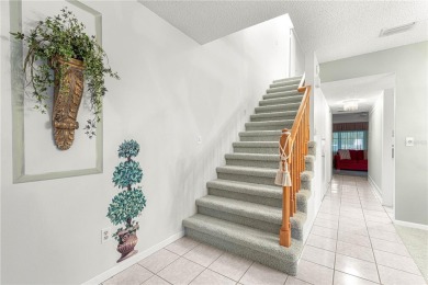 SPACIOUS Two-Level Townhome located in the Americana on On Top of the World Golf Course in Florida - for sale on GolfHomes.com, golf home, golf lot