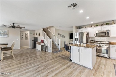 This stunning recently remodeled 5-bed, 3-bath home is a on Augusta Ranch Golf Club in Arizona - for sale on GolfHomes.com, golf home, golf lot