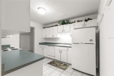 SPACIOUS Two-Level Townhome located in the Americana on On Top of the World Golf Course in Florida - for sale on GolfHomes.com, golf home, golf lot