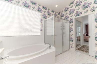 NEW to Market, this Ballantrae home with 3 bedrooms, 2 bathrooms on Santa Lucia River Club in Florida - for sale on GolfHomes.com, golf home, golf lot