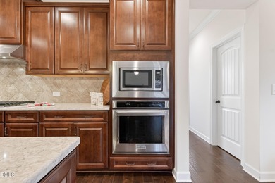 Discover this stunning semi-custom luxury home with a THREE CAR on The Preserve At Jordan Lake Golf Club in North Carolina - for sale on GolfHomes.com, golf home, golf lot