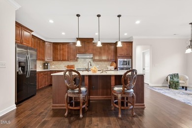 Discover this stunning semi-custom luxury home with a THREE CAR on The Preserve At Jordan Lake Golf Club in North Carolina - for sale on GolfHomes.com, golf home, golf lot