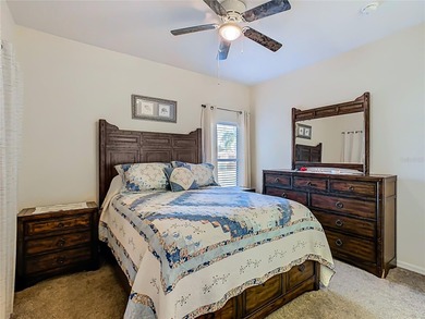 Melody model set on a water view lot in the heart of Solivita on Stonegate Golf Club in Florida - for sale on GolfHomes.com, golf home, golf lot