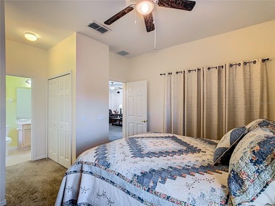 Melody model set on a water view lot in the heart of Solivita on Stonegate Golf Club in Florida - for sale on GolfHomes.com, golf home, golf lot