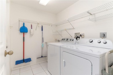 NEW to Market, this Ballantrae home with 3 bedrooms, 2 bathrooms on Santa Lucia River Club in Florida - for sale on GolfHomes.com, golf home, golf lot