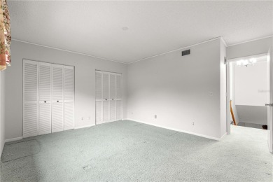 SPACIOUS Two-Level Townhome located in the Americana on On Top of the World Golf Course in Florida - for sale on GolfHomes.com, golf home, golf lot