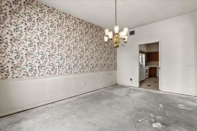 **SELLER IS PREPARED TO REPLACE THE ROOF PRIOR TO CLOSING** on Eastwood Golf Club in Florida - for sale on GolfHomes.com, golf home, golf lot