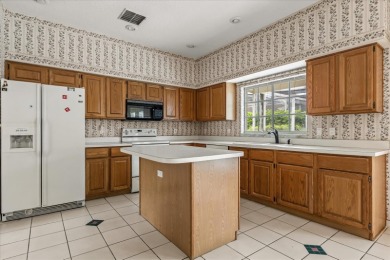 **SELLER IS PREPARED TO REPLACE THE ROOF PRIOR TO CLOSING** on Eastwood Golf Club in Florida - for sale on GolfHomes.com, golf home, golf lot