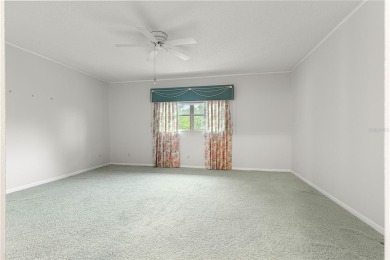 SPACIOUS Two-Level Townhome located in the Americana on On Top of the World Golf Course in Florida - for sale on GolfHomes.com, golf home, golf lot