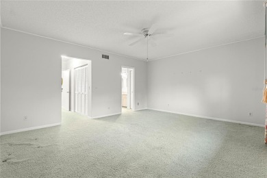 SPACIOUS Two-Level Townhome located in the Americana on On Top of the World Golf Course in Florida - for sale on GolfHomes.com, golf home, golf lot