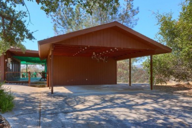 Take a look at this charming home located in the Yosemite Lakes on Yosemite Lakes Park Golf Course in California - for sale on GolfHomes.com, golf home, golf lot