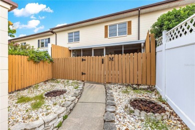 SPACIOUS Two-Level Townhome located in the Americana on On Top of the World Golf Course in Florida - for sale on GolfHomes.com, golf home, golf lot