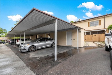 SPACIOUS Two-Level Townhome located in the Americana on On Top of the World Golf Course in Florida - for sale on GolfHomes.com, golf home, golf lot