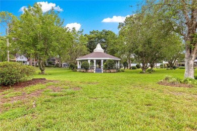 SPACIOUS Two-Level Townhome located in the Americana on On Top of the World Golf Course in Florida - for sale on GolfHomes.com, golf home, golf lot