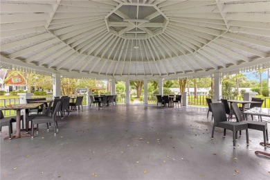 SPACIOUS Two-Level Townhome located in the Americana on On Top of the World Golf Course in Florida - for sale on GolfHomes.com, golf home, golf lot