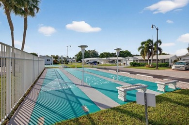 Beautifully renovated 2BR/2BA single-family home with NEW solar on Leisureville Community Association in Florida - for sale on GolfHomes.com, golf home, golf lot