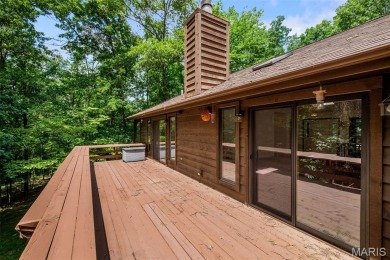 Tucked among the trees this spacious 4-bedroom retreat offers on Innsbrook Resort Golf Course in Missouri - for sale on GolfHomes.com, golf home, golf lot