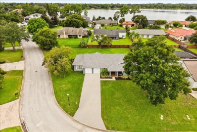 Welcome to this beautifully remodeled 5-bedroom, 3-bath home on Orange Tree Golf Club in Florida - for sale on GolfHomes.com, golf home, golf lot