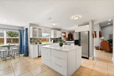 Welcome to this beautifully remodeled 5-bedroom, 3-bath home on Orange Tree Golf Club in Florida - for sale on GolfHomes.com, golf home, golf lot