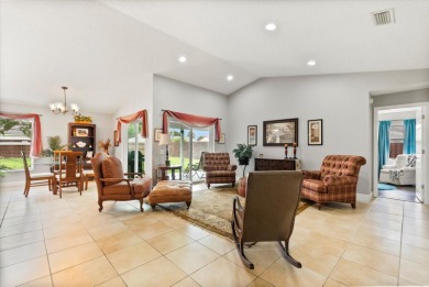 Welcome to this beautifully remodeled 5-bedroom, 3-bath home on Orange Tree Golf Club in Florida - for sale on GolfHomes.com, golf home, golf lot