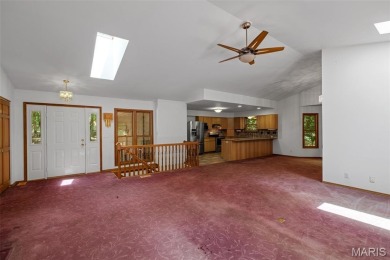 Tucked among the trees this spacious 4-bedroom retreat offers on Innsbrook Resort Golf Course in Missouri - for sale on GolfHomes.com, golf home, golf lot