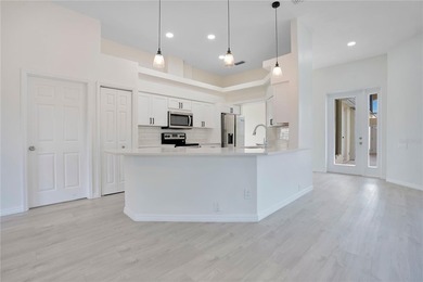 Welcome to your private Florida oasis in the highly sought-after on Oyster Creek Golf Club in Florida - for sale on GolfHomes.com, golf home, golf lot