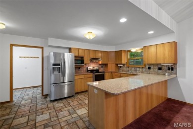 Tucked among the trees this spacious 4-bedroom retreat offers on Innsbrook Resort Golf Course in Missouri - for sale on GolfHomes.com, golf home, golf lot