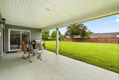 Welcome to this beautifully remodeled 5-bedroom, 3-bath home on Orange Tree Golf Club in Florida - for sale on GolfHomes.com, golf home, golf lot