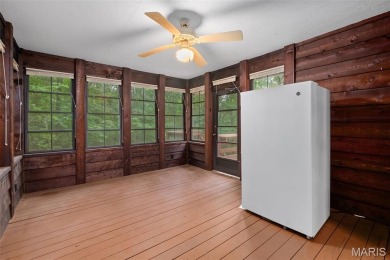 Tucked among the trees this spacious 4-bedroom retreat offers on Innsbrook Resort Golf Course in Missouri - for sale on GolfHomes.com, golf home, golf lot