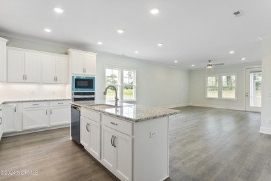 Welcome to beach life in this adorable, easy to live in home on Brick Landing Plantation Yacht and Golf Club in North Carolina - for sale on GolfHomes.com, golf home, golf lot