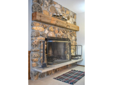 Enjoy the beauty of living within the Rocky Shores Condominium's on Alpine Resort and Golf Course in Wisconsin - for sale on GolfHomes.com, golf home, golf lot