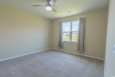 Gorgeous three-bedroom, two-bath home in The Vistas of Sun on Palmetto Greens Golf and Country Club in South Carolina - for sale on GolfHomes.com, golf home, golf lot