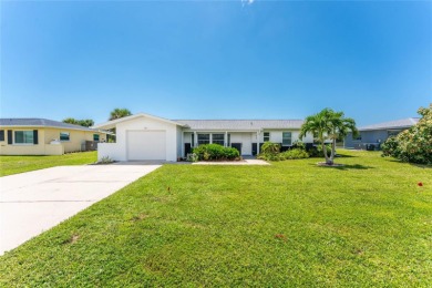 Nature's Backyard: Sunsets, Waterfront Serenity, and Wildlife in on Rotonda Golf and Country Club The Hills Course in Florida - for sale on GolfHomes.com, golf home, golf lot