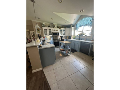 Unveiling Your Dream Home: Golf Course Frontage & Exquisite on Schalamar Creek Golf and Country Club in Florida - for sale on GolfHomes.com, golf home, golf lot