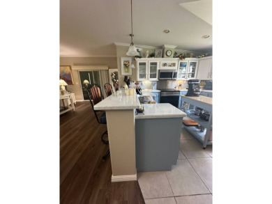 Unveiling Your Dream Home: Golf Course Frontage & Exquisite on Schalamar Creek Golf and Country Club in Florida - for sale on GolfHomes.com, golf home, golf lot