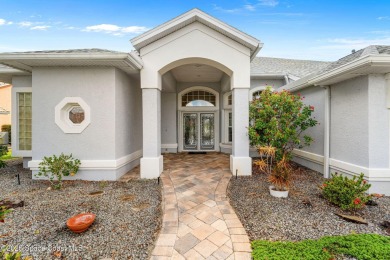 Experience peaceful comfort and style in one of the most on Suntree Country Club in Florida - for sale on GolfHomes.com, golf home, golf lot