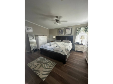 Unveiling Your Dream Home: Golf Course Frontage & Exquisite on Schalamar Creek Golf and Country Club in Florida - for sale on GolfHomes.com, golf home, golf lot
