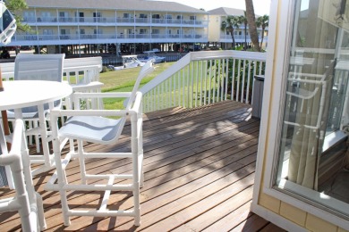 Charming, cozy and canal front!! This is your chance to snatch on Sandpiper Cove Golf Course in Florida - for sale on GolfHomes.com, golf home, golf lot