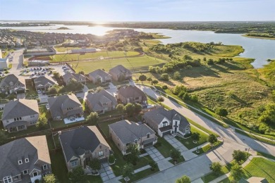 Experience the ultimate in luxury and privacy at 5221 Sylvan on The Tribute At the Colony in Texas - for sale on GolfHomes.com, golf home, golf lot