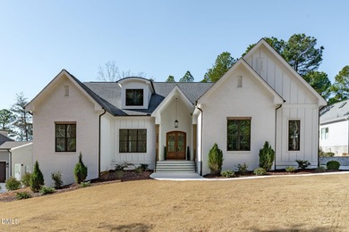 Modern Ranch Farmhouse with Golf Course Views. Built less than on Chapel Ridge Golf Club in North Carolina - for sale on GolfHomes.com, golf home, golf lot