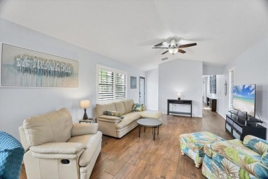 Discover effortless coastal charm in this rare end-unit villa on Rotonda Golf and Country Club The Palms Course in Florida - for sale on GolfHomes.com, golf home, golf lot