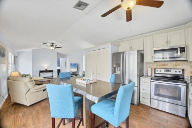 Discover effortless coastal charm in this rare end-unit villa on Rotonda Golf and Country Club The Palms Course in Florida - for sale on GolfHomes.com, golf home, golf lot