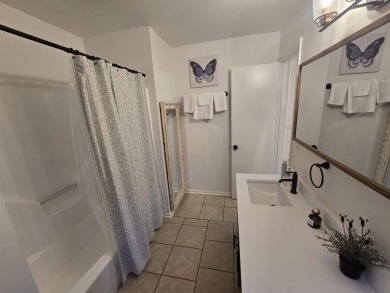 This beautifully updated 2-bedroom, 1.5-bathroom home boasts a on Mountain Ranch Golf Club in Arkansas - for sale on GolfHomes.com, golf home, golf lot